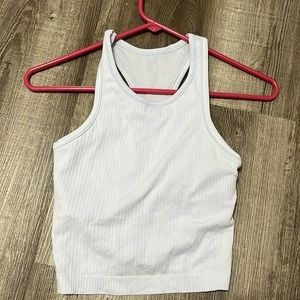 Luluemon ripped tank top ebb, purpleish blue cropped, slightly used no pilling